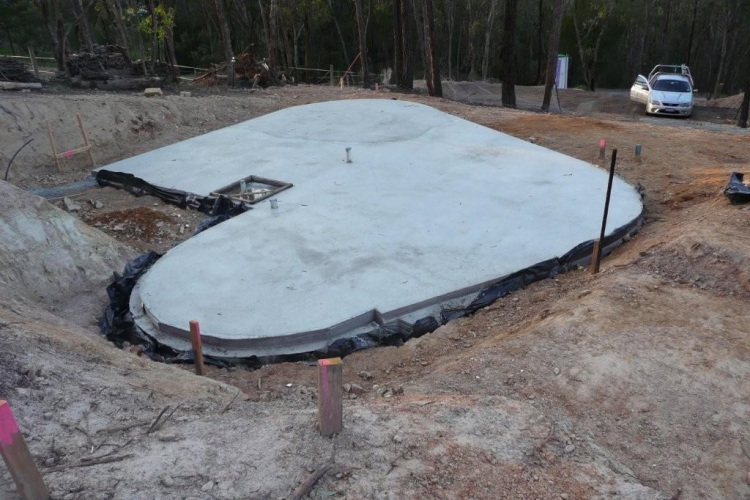 House slab with curved walls