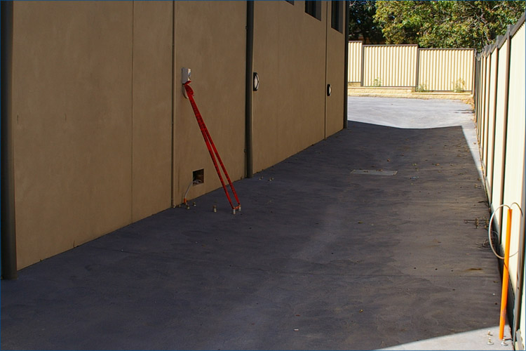 Cmmercial close up photo of concrete for ringwood emergency centre, landscaped to suit area and gardening. 