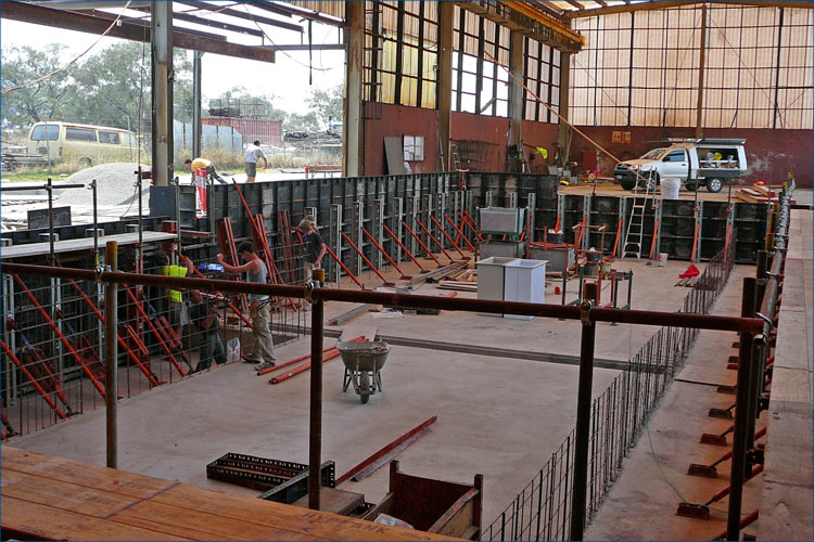 Commercial photo of concrete works including the laying of the main factory floor slab.