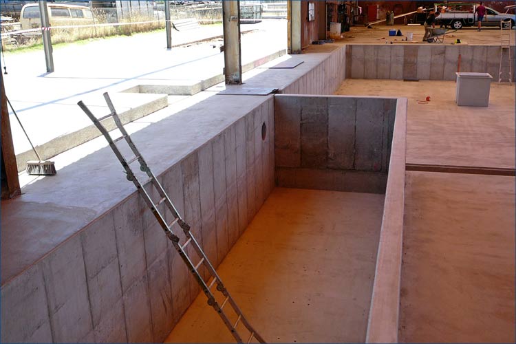 Commercial photo of concrete works including the laying of the main factory floor slab.